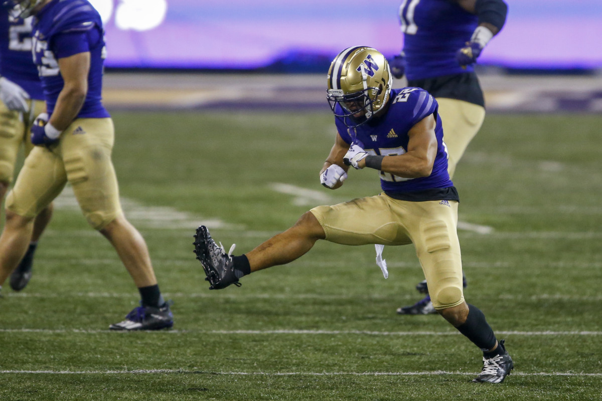 Nov 28, 2020; Seattle, Washington, USA; Washington Huskies defensive back Trent McDuffie (22) reacts following a turnover on downs against the Utah Utes during the third quarter at Alaska Airlines Field at Husky Stadium. Mandatory Credit: Joe Nicholson-USA TODAY Sports